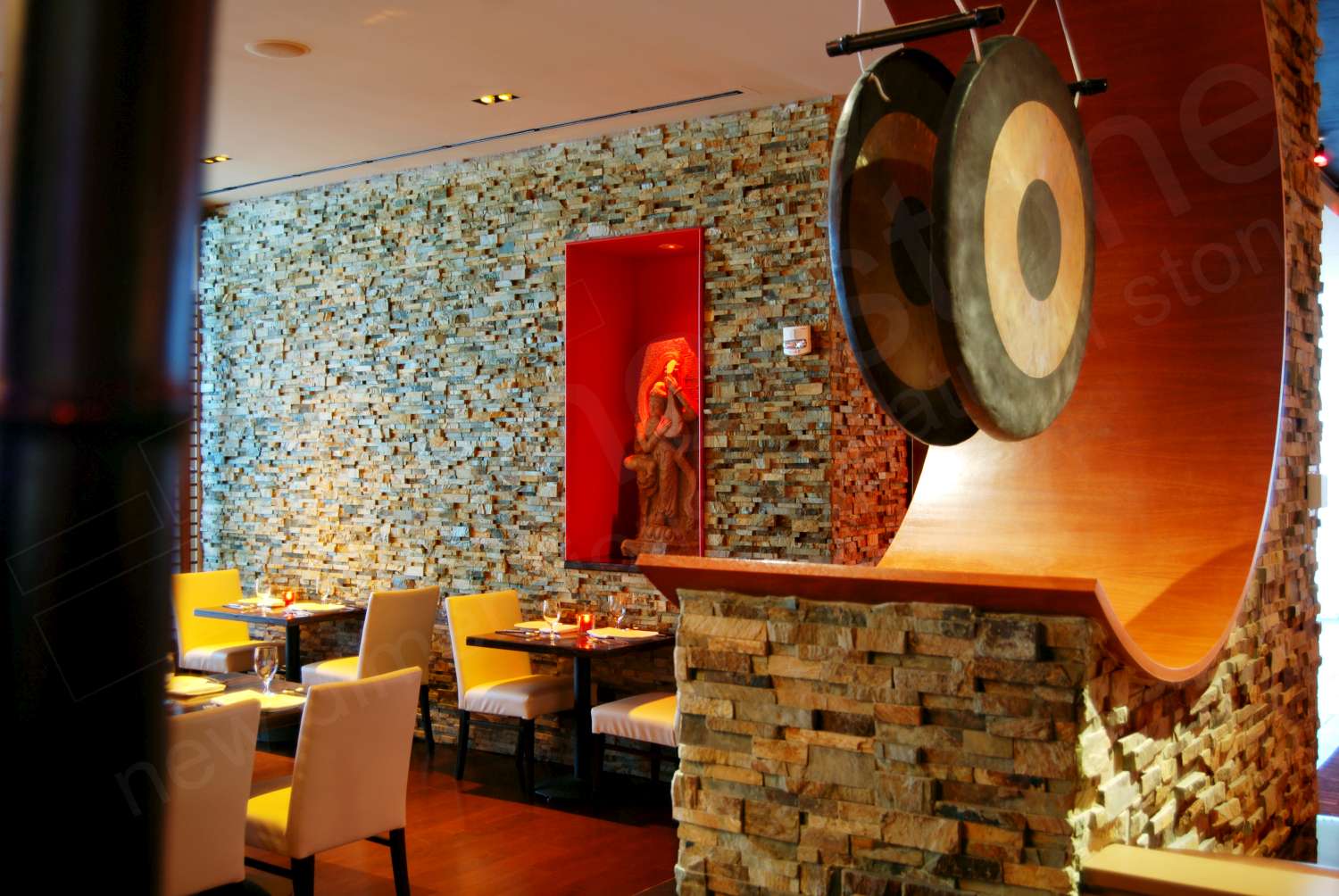 Norstone Ochre Blend Stone Veneer Rock Panels on a column and feature wall at Susanna Foo's restaurant in Pennsylvania